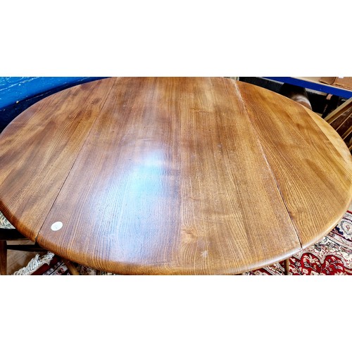 322 - Ercol oval drop leaf dining table and 4 Ercol Quaker chairs