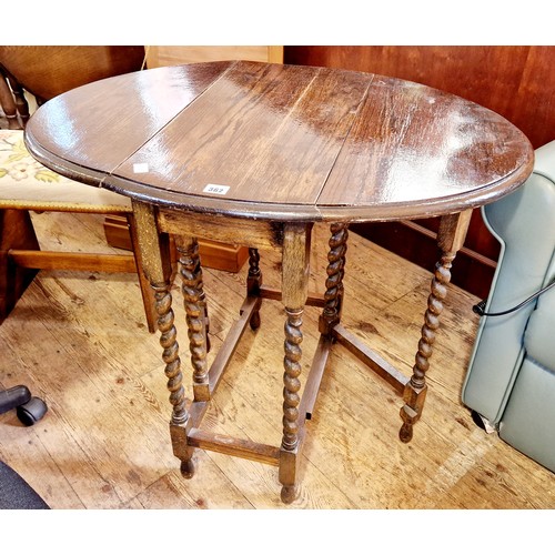 362 - Small early 20th century oak oval gate leg table on barley twist supports