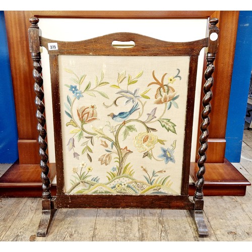 375 - Oak framed tapestry fire screen with barley twist supports