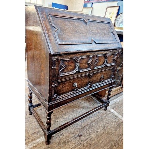 386 - Early 20th century oak bureau with geometric relief panels on barley twist legs