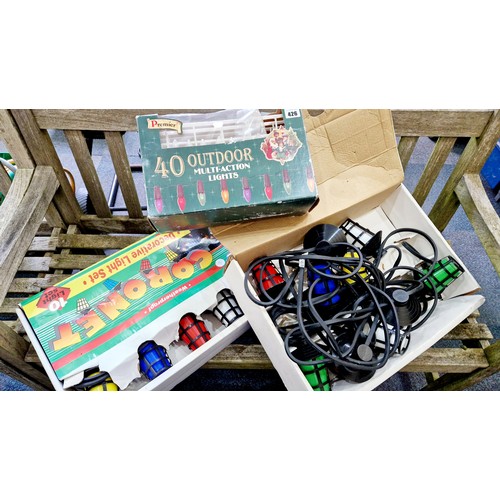 426 - Two sets of coloured outdoor lights, mains powered