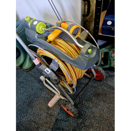 448 - Garden hose on a reel trolley