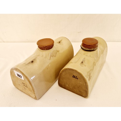 102 - Two stoneware hotwater bottles