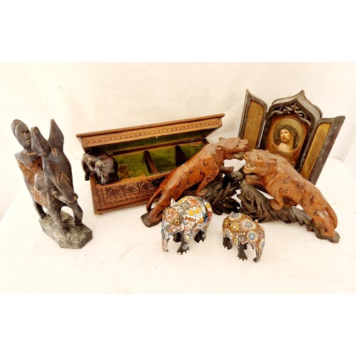 124 - Treenware comprising various animal figurines, carved musical jewellery box etc