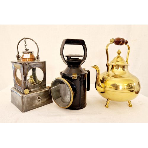 127 - Two vintage railway lanterns and a reproduction brass kettle