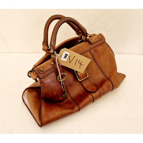140 - Fossil ladies large leather handbag and purse