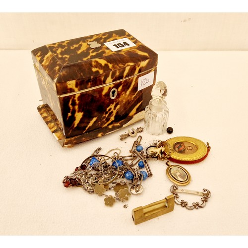 154 - Tortoiseshell veneered jewellery casket (damaged), with various jewellery, scent bottle etc