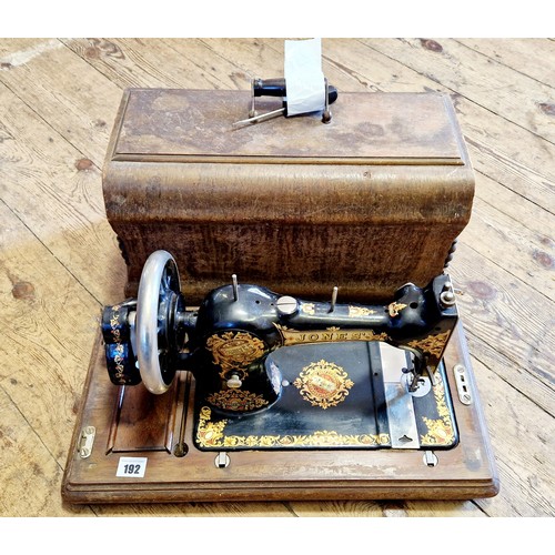 192 - Jones' vintage cased sewing machine