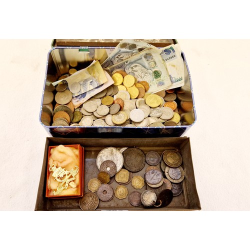 282 - Two tins of coins and bank notes incl. British early decimal and pre-decimal, United Arab Emirates n... 