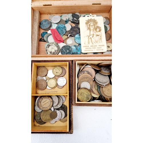 284 - Four wooden boxes of various British pre-decimal, Continental and other coins