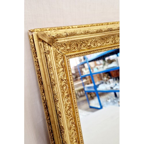 315 - Modern rectangular wall mirror in ornate gilt frame