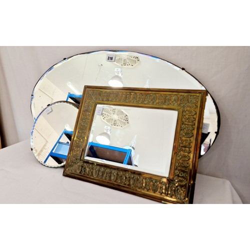 316 - Oval and circular frameless wall mirrors and rectangular relief brass framed mirror