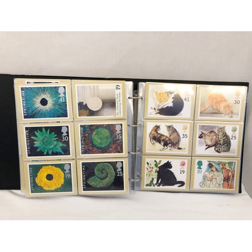 17 - An album of Royal Mint issue stamp cards including approx. 120 First Day issue, approx. 385 in total