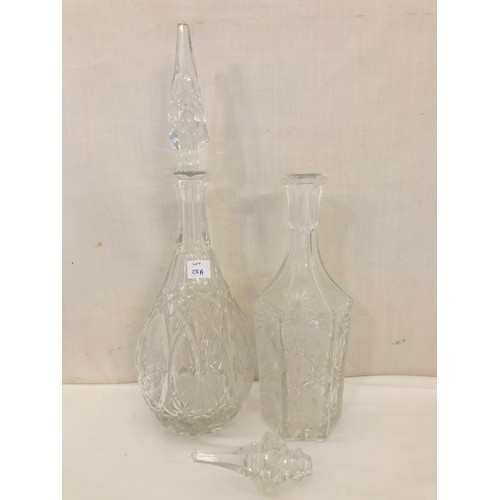 28A - Two glass decanters, one with damaged stopper