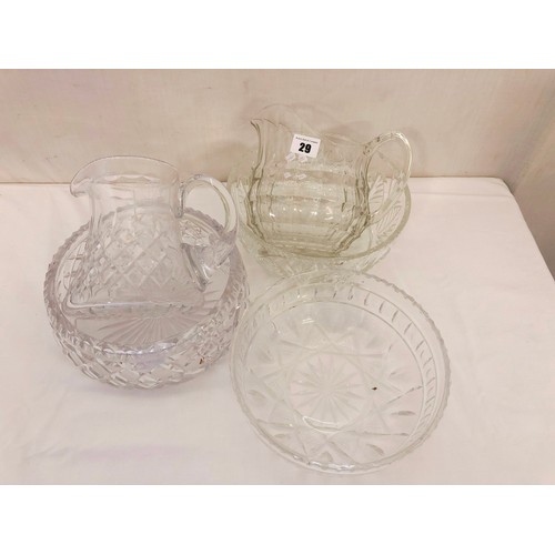 29 - Cut and moulded glassware comprising 3 fruit bowls and 2 water jugs
