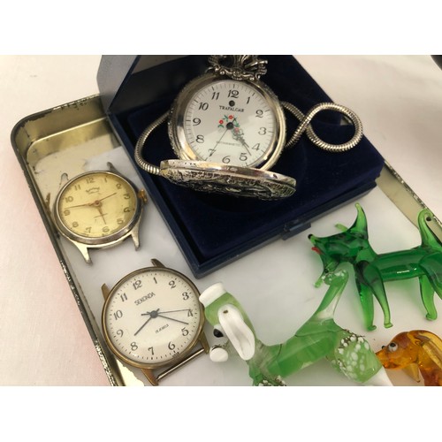 40 - Mixed lot comprising predominantly coloured glassware, Wade angel fish, reproduction fob watch etc
