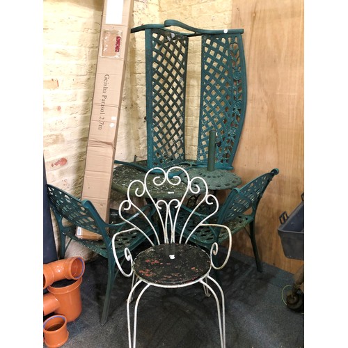 436 - Garden furniture comprising pierced metal table, chairs, parasol and base etc