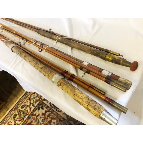 444 - Three vintage split and tubular cane fishing rods