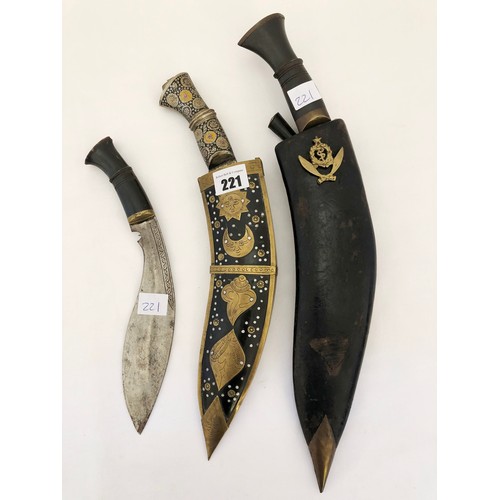 221 - An Indian Kukri with Gurkha Medical Corps badge 7 two smaller Indian knives, one with decorative sca... 