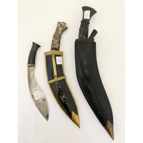 221 - An Indian Kukri with Gurkha Medical Corps badge 7 two smaller Indian knives, one with decorative sca... 