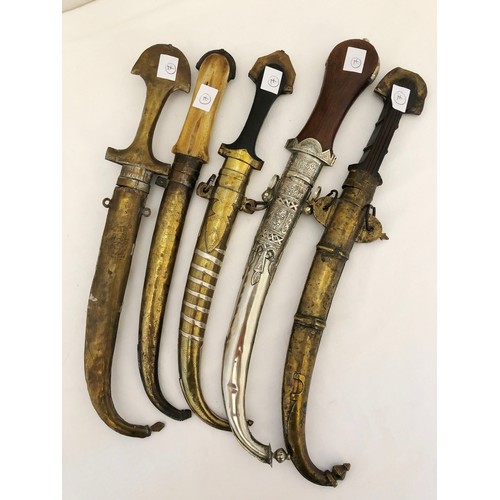 227 - A collection of five Indian jambiya daggers with sheaths