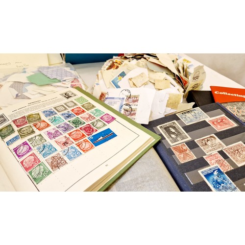14A - Stamps including universal stamp album, 3 stock albums, GB and general world collection with many lo... 