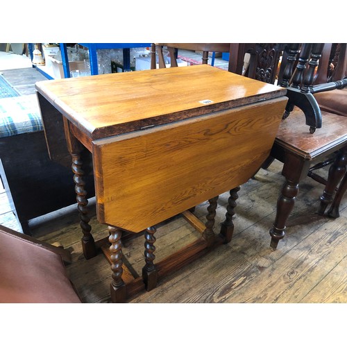 303 - Small oak rectangular gate leg table on barley twist legs