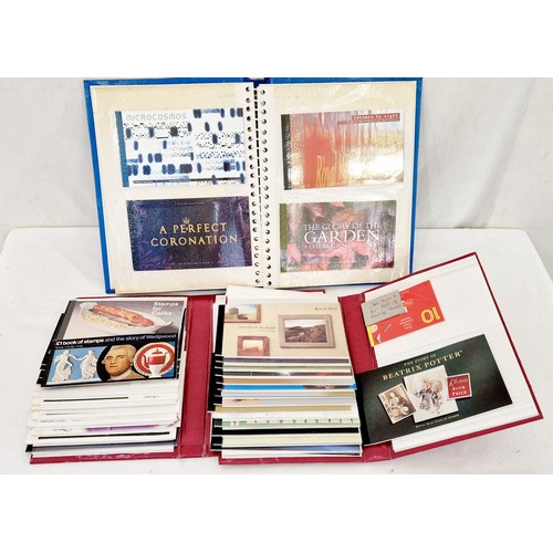 18 - A collection of prestige stamp books in 3 albums incl. Cooks and Wedgewood 1972-2003