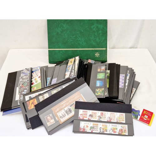 19 - A collection of mint GB commemorative stamps