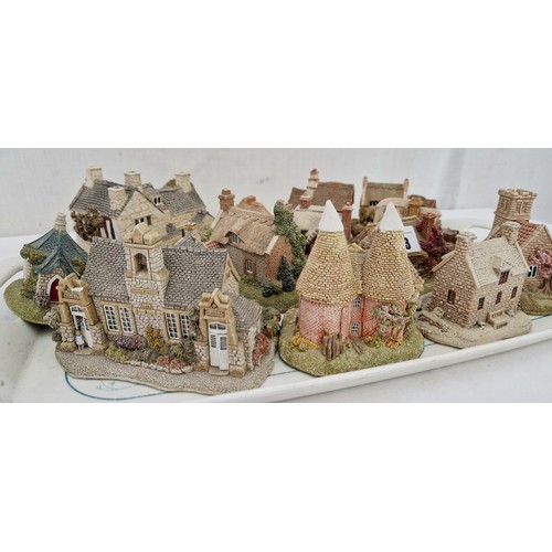 63 - A collection of 13 Lilliput cottages