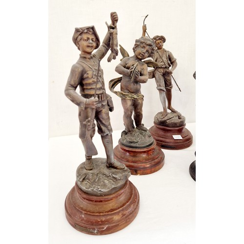 94 - Collection of 6 various spelter figurines, sporting, putti and literature