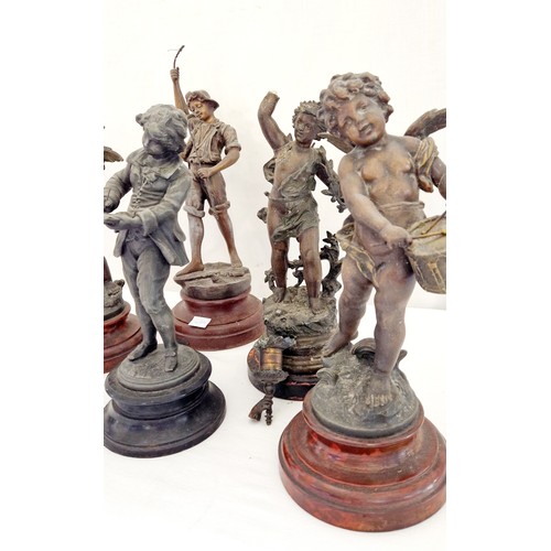 94 - Collection of 6 various spelter figurines, sporting, putti and literature