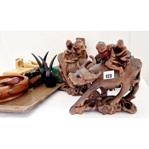 123 - Treen carvings comprising pair of Water Buffalo with riders, pair of elephants and nut bowl with ham... 