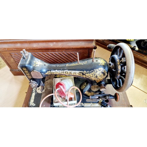 179 - Cased vintage Singer sewing machine