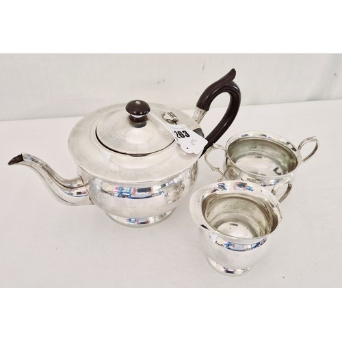 263 - A Birmingham 1931 three piece tea service comprising teapot, cream and sugar, on circular pedestal b... 