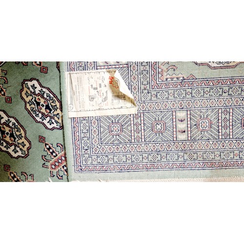 276 - Turkish green patterned woollen rug approx. 67