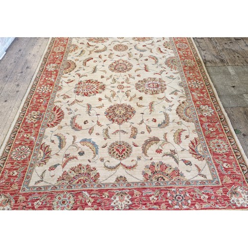 280 - Living Treasures patterned woollen rug, c. 250 x 165 cm