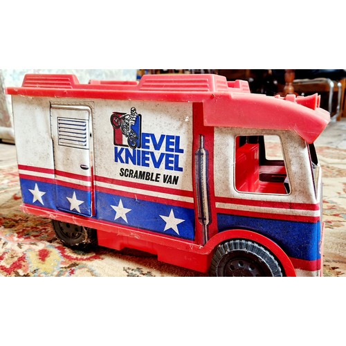 225 - Various vintage toys including the Evel Knievel scramble van, stamp albums etc