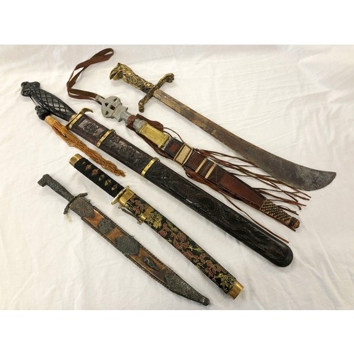 146 - Group of five assorted mainly eastern swords and knives etc, incl. Greek and Japanese daggers; an As... 