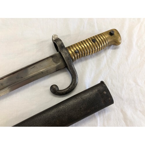 168 - A French 1866 Chassepot sword bayonet, stamped 11 to blade and inscribed on back edge, dated August ... 