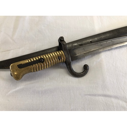 168 - A French 1866 Chassepot sword bayonet, stamped 11 to blade and inscribed on back edge, dated August ... 