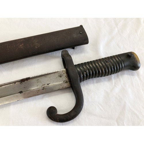 167 - French 1866 Chassepot sword bayonet, stamped C 67191 on the hilt and 32618 to the metal scabbard, in... 