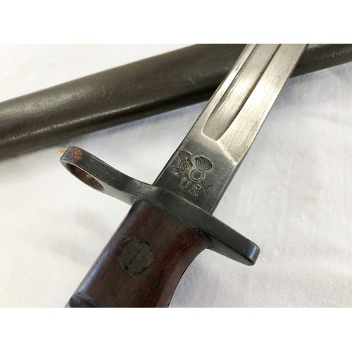 163 - A US 1917 Remington bayonet and stamped scabbard (point end missing)