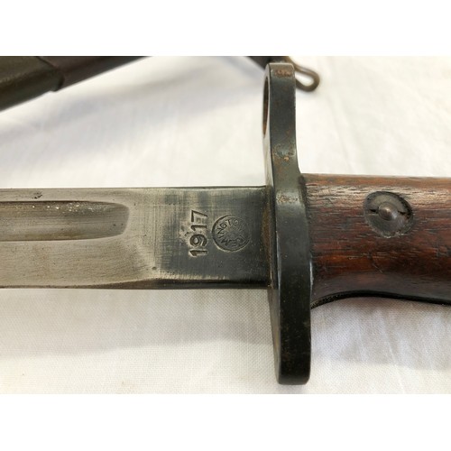 163 - A US 1917 Remington bayonet and stamped scabbard (point end missing)