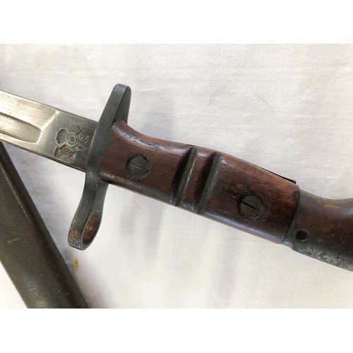 163 - A US 1917 Remington bayonet and stamped scabbard (point end missing)