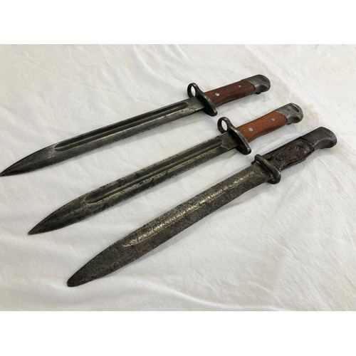 161 - Three knife bayonets, possibly all German-made: one an 1884/98 with blade stamped 3926; two further ... 