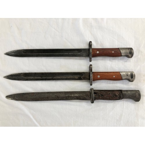 161 - Three knife bayonets, possibly all German-made: one an 1884/98 with blade stamped 3926; two further ... 