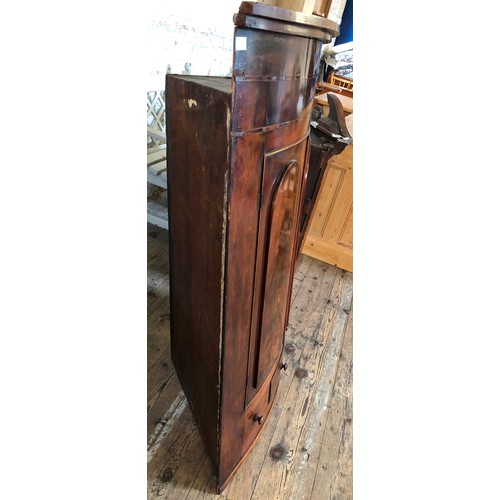 334 - 19th Century mahogany bow fronted wall mounted corner cupboard with shelved interior and single draw... 