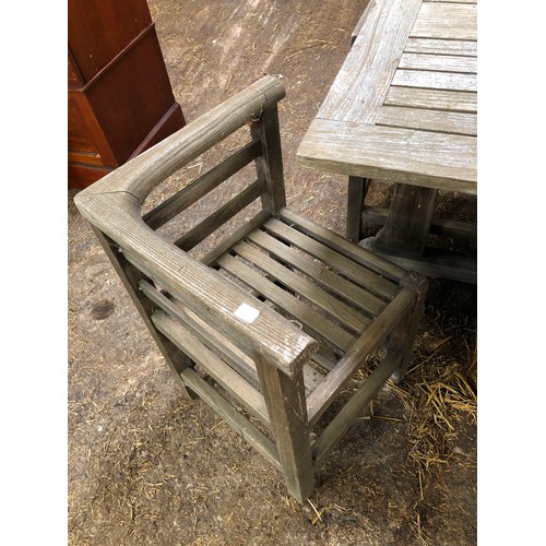 443 - Wooden slatted garden set comprising square table and 4 corner chairs, by RA Lister