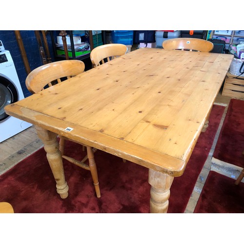 300 - Rectangular pine kitchen table on earlier base to turned legs